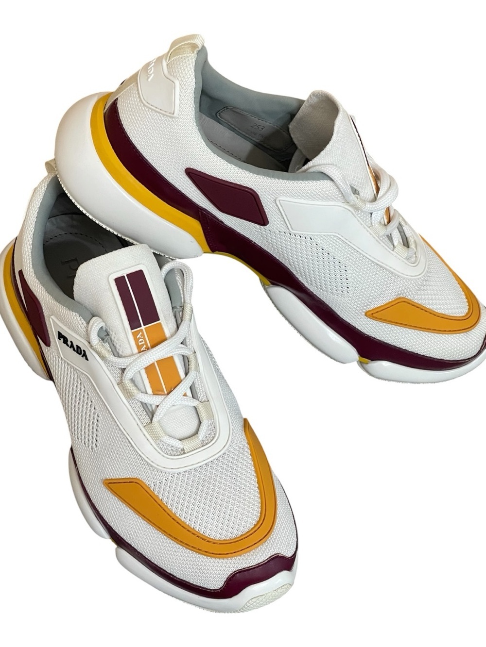 Prada White, Burgundy & Orange
Cloudbust Trainers size size 5(35)